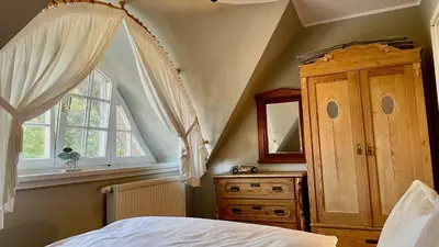 Ein Bett oder Betten in einem Zimmer der Unterkunft Haus Strandgut FW 6