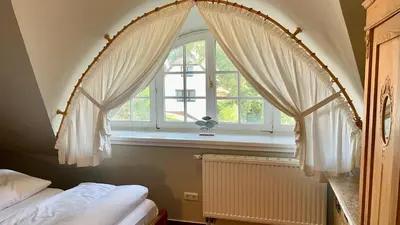 Ein Bett oder Betten in einem Zimmer der Unterkunft Haus Strandgut FW 6