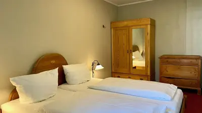 Ein Bett oder Betten in einem Zimmer der Unterkunft Haus Strandgut FW 2