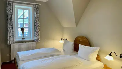 Ein Bett oder Betten in einem Zimmer der Unterkunft Haus Strandgut FW 5