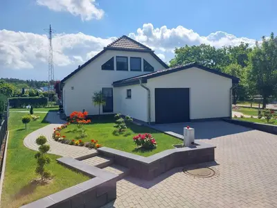 Ein Garten an der Unterkunft Haus am Bodden
