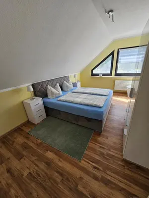 Ein Bett oder Betten in einem Zimmer der Unterkunft Haus am Bodden