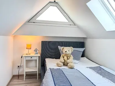 Ein Bett oder Betten in einem Zimmer der Unterkunft Windland