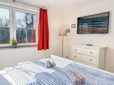 Ein Bett oder Betten in einem Zimmer der Unterkunft Windland