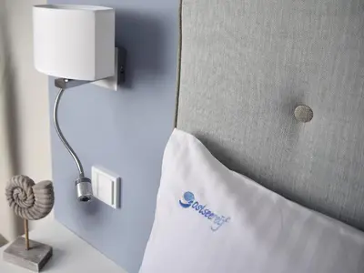 Ein Bett oder Betten in einem Zimmer der Unterkunft Ferienwohnung Ostseereif WE51
