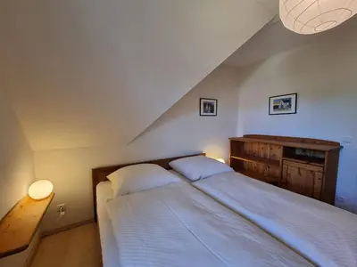 Ein Bett oder Betten in einem Zimmer der Unterkunft Buchfink