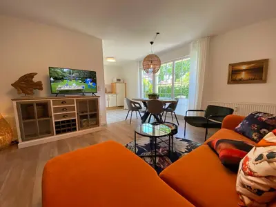Ein Sitzbereich in der Unterkunft Dat Gele Hus Wohnung 2