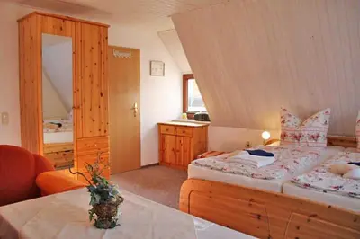 Ein Bett oder Betten in einem Zimmer der Unterkunft Ferienwohnungen Pachal