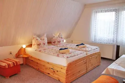 Ein Bett oder Betten in einem Zimmer der Unterkunft Ferienwohnungen Pachal