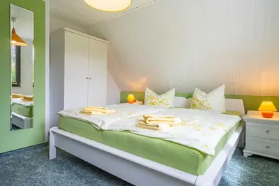 Ein Bett oder Betten in einem Zimmer der Unterkunft Ferienhaus 