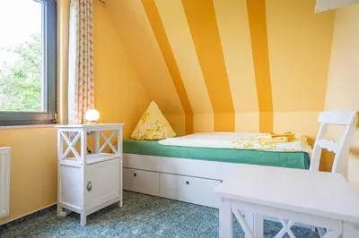 Ein Bett oder Betten in einem Zimmer der Unterkunft Ferienhaus 