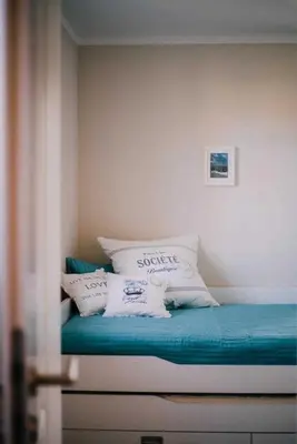 Ein Bett oder Betten in einem Zimmer der Unterkunft Haus 