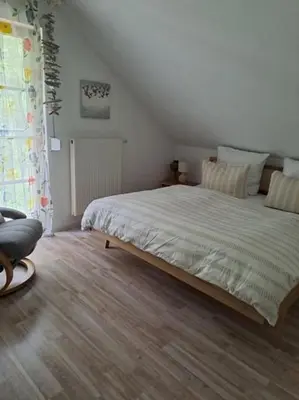 Ein Bett oder Betten in einem Zimmer der Unterkunft Schwalbenweg - b45866