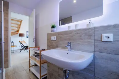 Ein Badezimmer in der Unterkunft Suite Strandrose