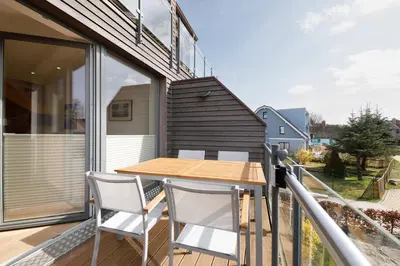 Ein Balkon oder eine Terrasse in der Unterkunft Suite Strandrose