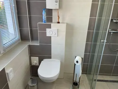 Ein Badezimmer in der Unterkunft Apartment Haus Stefanie by Interhome
