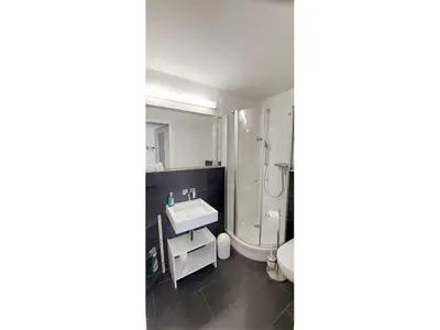 Ein Bett oder Betten in einem Zimmer der Unterkunft Birkenstrasse 6i Wohnung 14