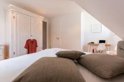 Ein Bett oder Betten in einem Zimmer der Unterkunft Bornhaus für 7 Personen