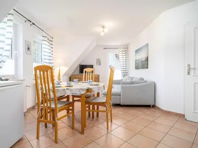 Ein Sitzbereich in der Unterkunft Abenteuer Zingst Top 4 Sterne Ferienwohnung Kormoran