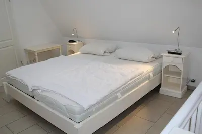 Ein Bett oder Betten in einem Zimmer der Unterkunft Wellnessresidenz 