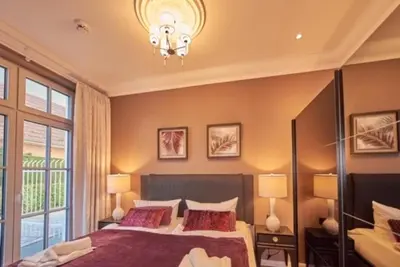Ein Bett oder Betten in einem Zimmer der Unterkunft Victoria Luna Ferienwohnung 