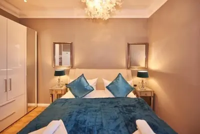Ein Bett oder Betten in einem Zimmer der Unterkunft Victoria Luna Ferienwohnung 