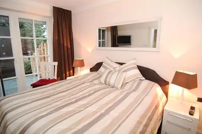 Ein Bett oder Betten in einem Zimmer der Unterkunft FeWo 1Kleine