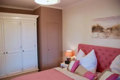 Ein Bett oder Betten in einem Zimmer der Unterkunft Sehnsucht 4