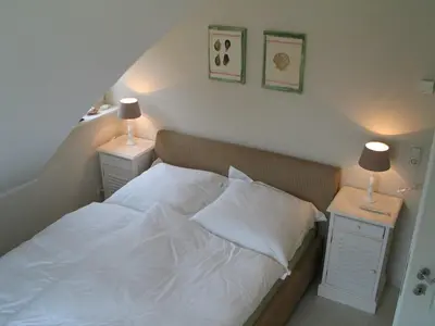 Ein Bett oder Betten in einem Zimmer der Unterkunft Godeke Michels Ferienwohnung 35Susewind Müggenburger Weg 40