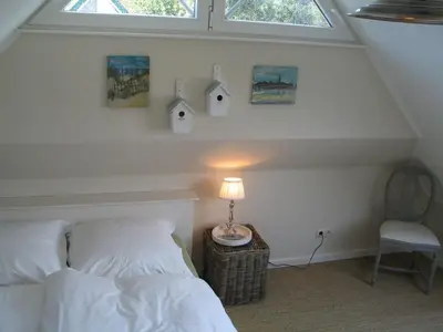 Ein Bett oder Betten in einem Zimmer der Unterkunft Godeke Michels Ferienwohnung 35Susewind Müggenburger Weg 40