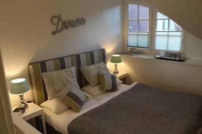 Ein Bett oder Betten in einem Zimmer der Unterkunft Ferienhaus Sehnsucht