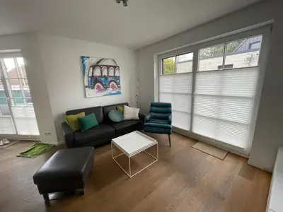 Ein Sitzbereich in der Unterkunft Ferienwohnung 1 Rämel 20