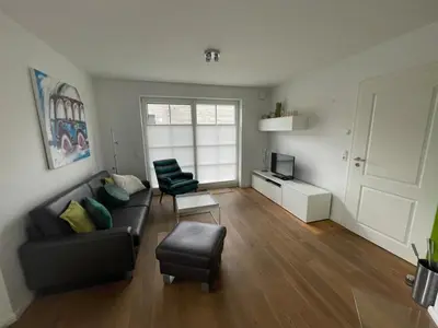 Ein Sitzbereich in der Unterkunft Ferienwohnung 1 Rämel 20