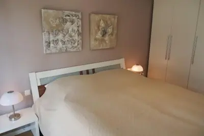 Ein Bett oder Betten in einem Zimmer der Unterkunft Ferienwohnung 1 Rämel 20
