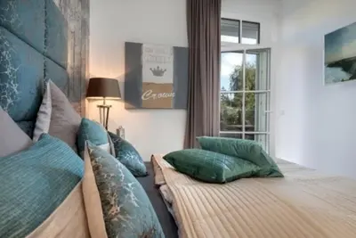 Ein Bett oder Betten in einem Zimmer der Unterkunft Victoria Luna I