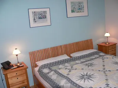 Ein Bett oder Betten in einem Zimmer der Unterkunft FeWo 1Eyckmanns