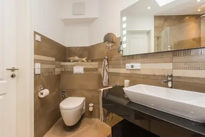Ein Badezimmer in der Unterkunft Victoria Luna Penthouse No 10 Strandstrstr48