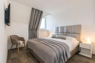 Ein Bett oder Betten in einem Zimmer der Unterkunft Victoria Luna Penthouse No 10 Strandstrstr48