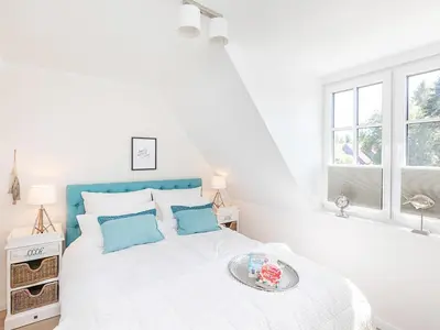 Ein Bett oder Betten in einem Zimmer der Unterkunft Wunderbar