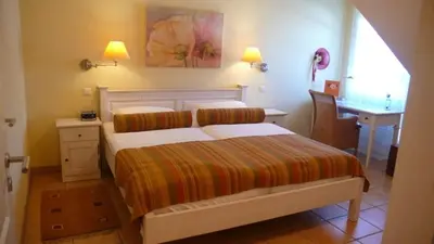 Ein Bett oder Betten in einem Zimmer der Unterkunft Wellnessresidenz 