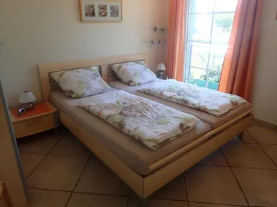 Ein Bett oder Betten in einem Zimmer der Unterkunft Ferienhaus Likedeeler Weg 13 