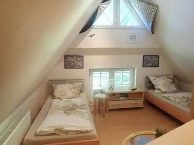 Ein Bett oder Betten in einem Zimmer der Unterkunft Ferienhaus Likedeeler Weg 13 
