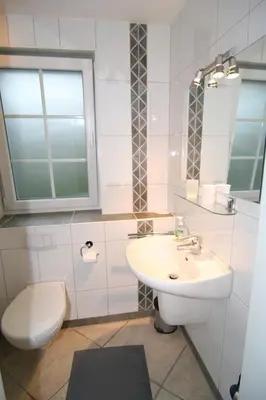 Ein Badezimmer in der Unterkunft Ferienhaus Likedeeler Weg 13 