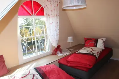 Ein Bett oder Betten in einem Zimmer der Unterkunft Ferienwohnung 3 