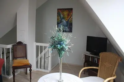 Ein Sitzbereich in der Unterkunft Ferienhaus Likedeeler Weg 23
