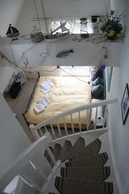 Ein Bett oder Betten in einem Zimmer der Unterkunft Ferienhaus Likedeeler Weg 23