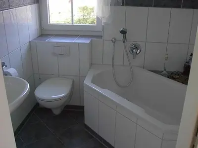 Ein Badezimmer in der Unterkunft Ferienhaus Likedeeler Weg 23