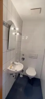 Ein Badezimmer in der Unterkunft Ferienwohnung Sünnenkringel 61