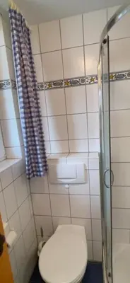 Ein Badezimmer in der Unterkunft Ferienwohnung Sünnenkringel 61