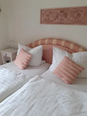 Ein Bett oder Betten in einem Zimmer der Unterkunft Wellnessresidenz 